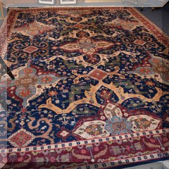 D07. Handknotted rug from India in blue and burgandy hues. 9' x 12' - $1500